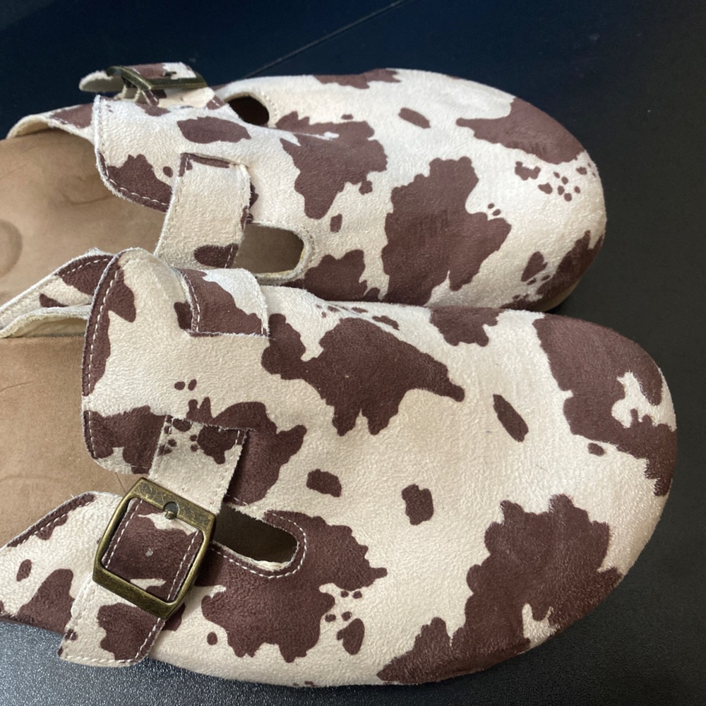 Cow print suede mules